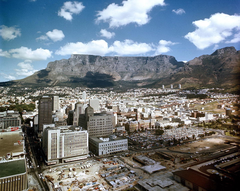 Aerial view of Cape Town with Table Mountain backdrop and the Atlantic Ocean coastline