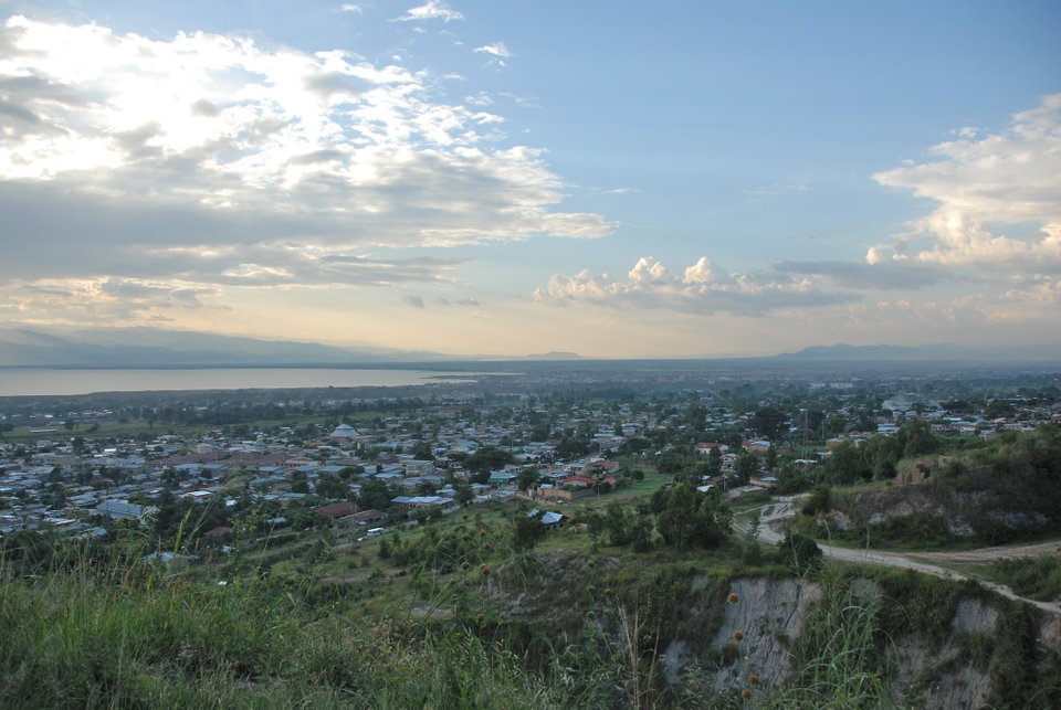 Bujumbura waterfront at sunset with Lake Tanganyika stretching to the horizon