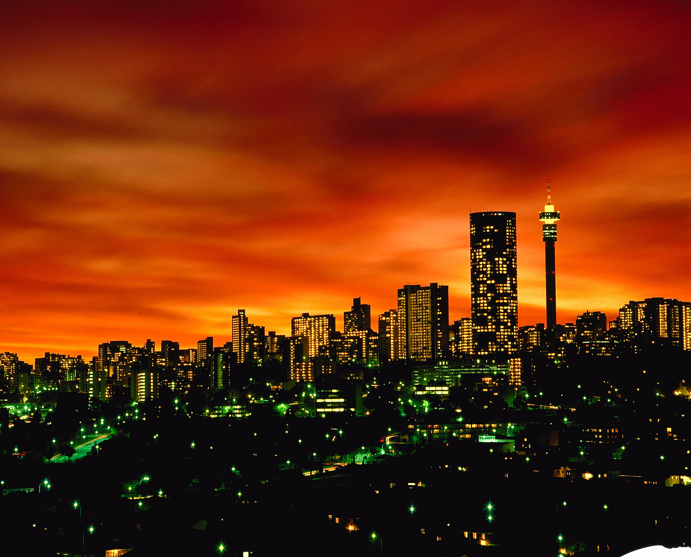 Johannesburg city skyline at sunset with golden light over the urban landscape