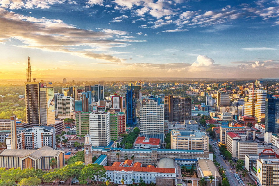Nairobi city skyline at dusk with the Ngong Hills in the background