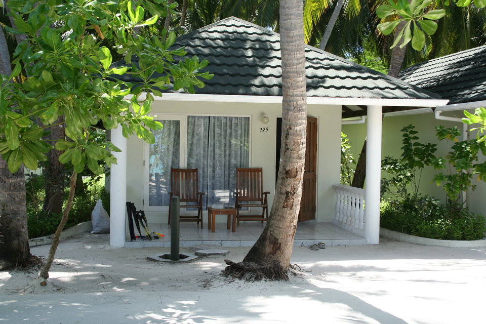 Turquoise lagoon and white sandy beach at Maamigili, South Ari Atoll, Maldives