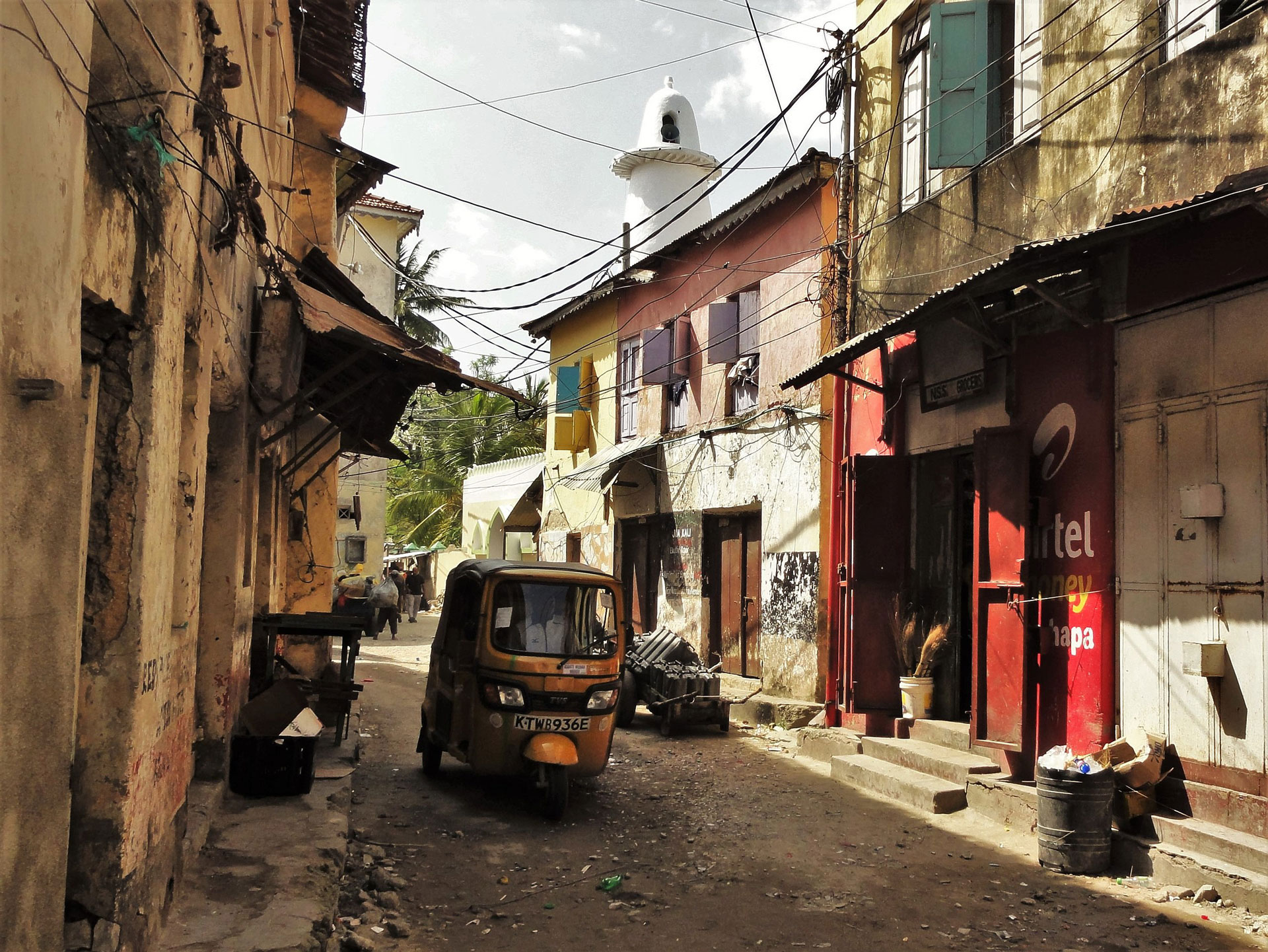 A tuktuk along a street in Mombasa's old town. 