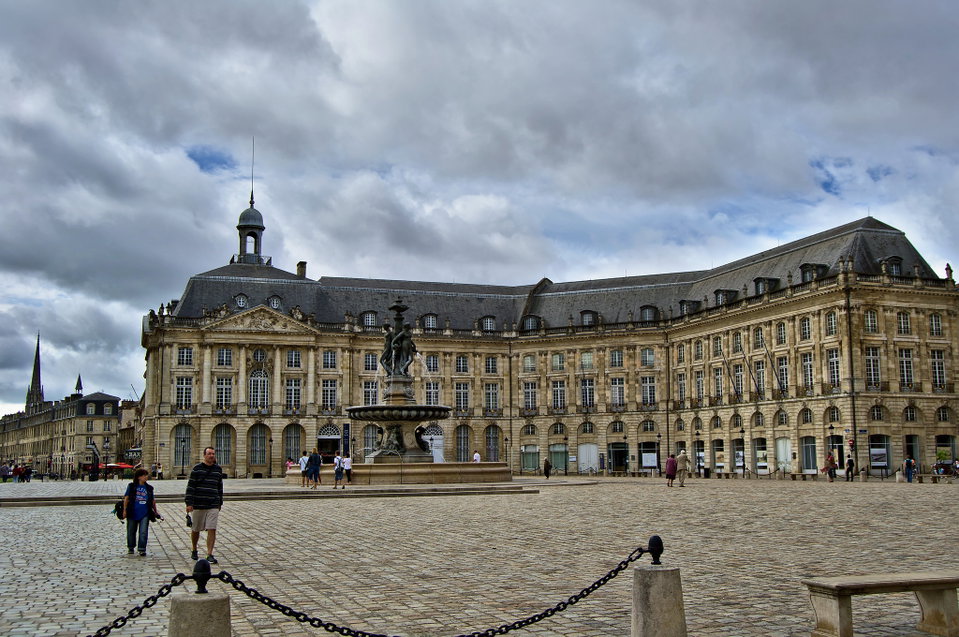 Golden-hour view of the Place de la Bourse reflected in the Miroir d'Eau, Bordeaux