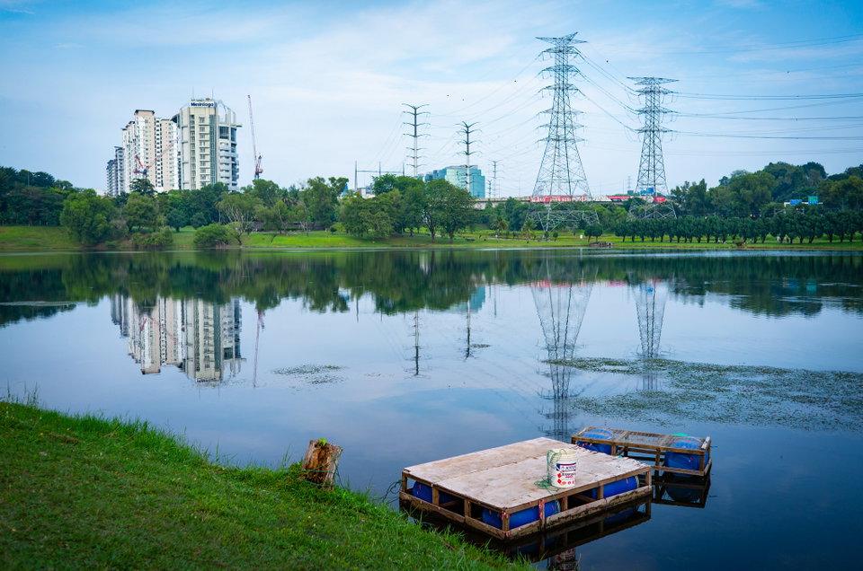 Subang Jaya skyline with suburban residential neighbourhoods and shopping malls surrounded by lush tropical greenery