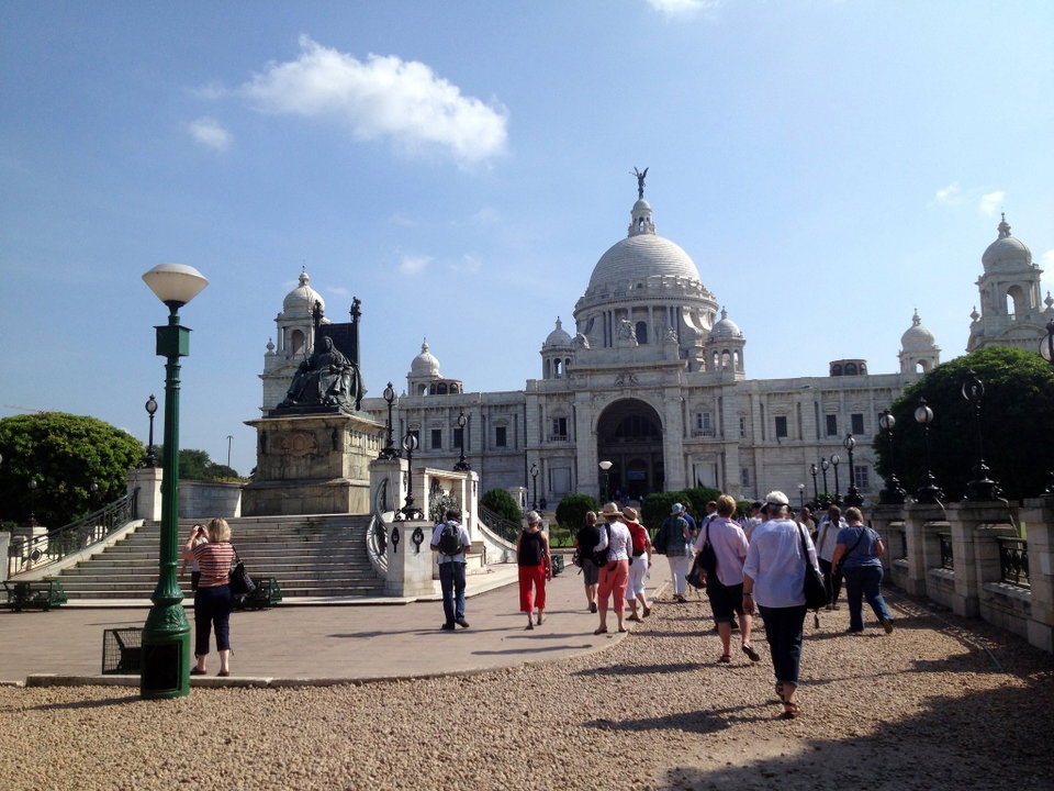 Victoria Memorial gleaming white against a blue sky in central Kolkata