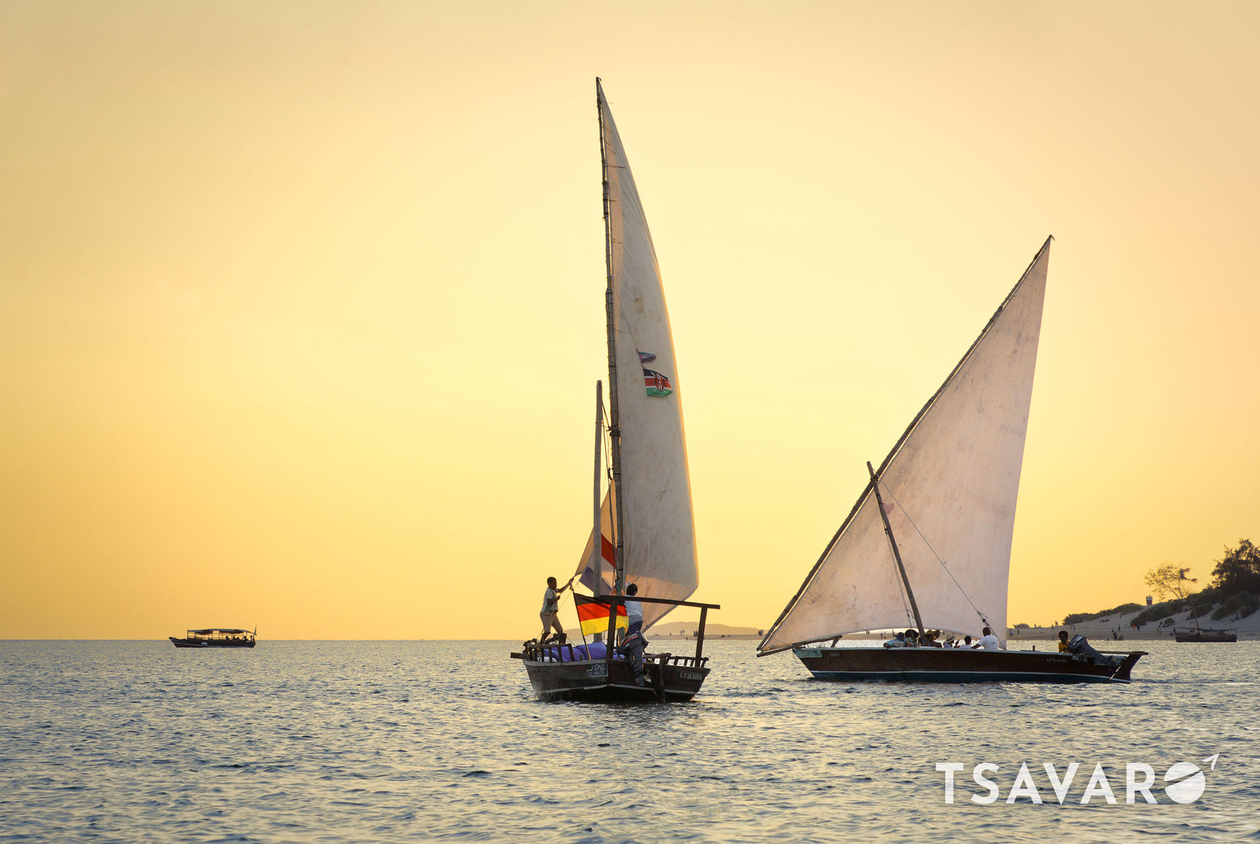 Dhows at sunset on the Indian Ocean in Lamu, Kenya. Photo by Joshua Wanyama.