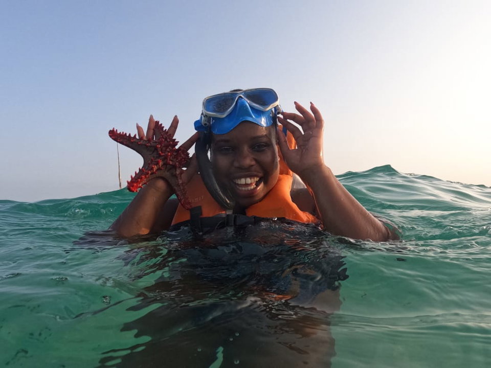 Laura swimming in the Indian Ocean in Diani. Photo courtesy of Laura Alinda. 