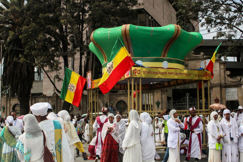 A throng of people walk during a religious street festival celebrating Meskel. 