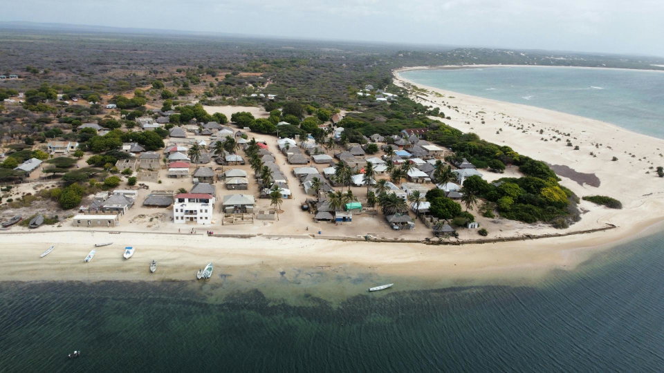 Pristine white sand beach in Malindi with traditional dhow boats