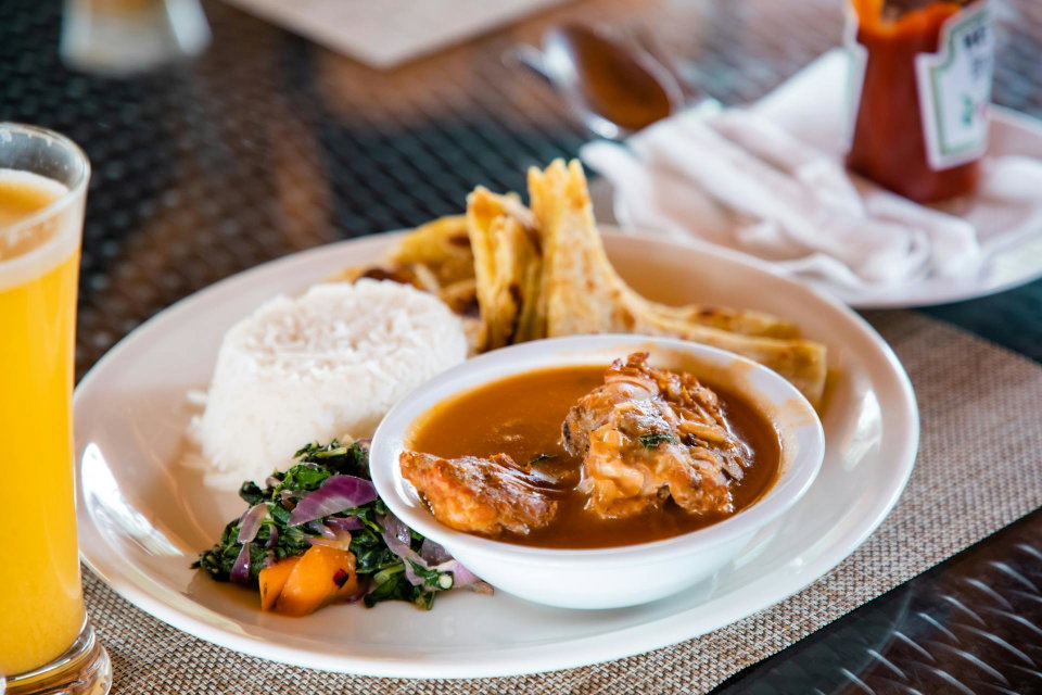 Meat in Sauce with Rice in Uganda. Photo by Workman House.