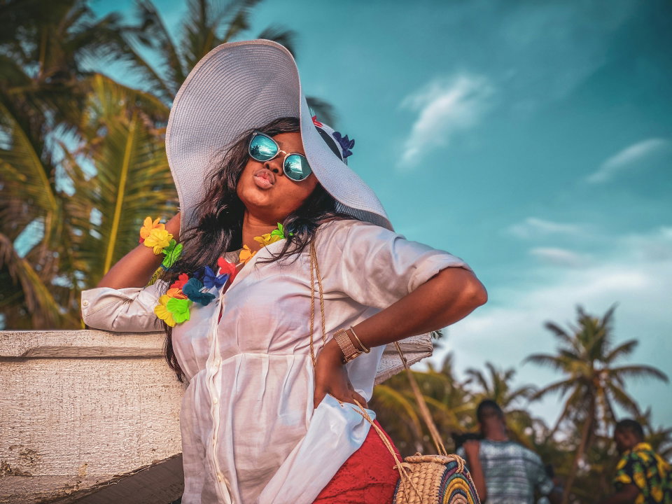 Fashionable woman poses for a photo while on holiday. Photo by Tope. A Asokere.